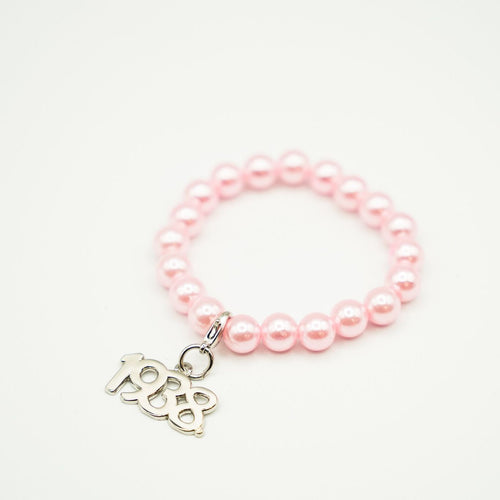 Jack and Jill Pink Pearl Bracelet with 1938 Charm
