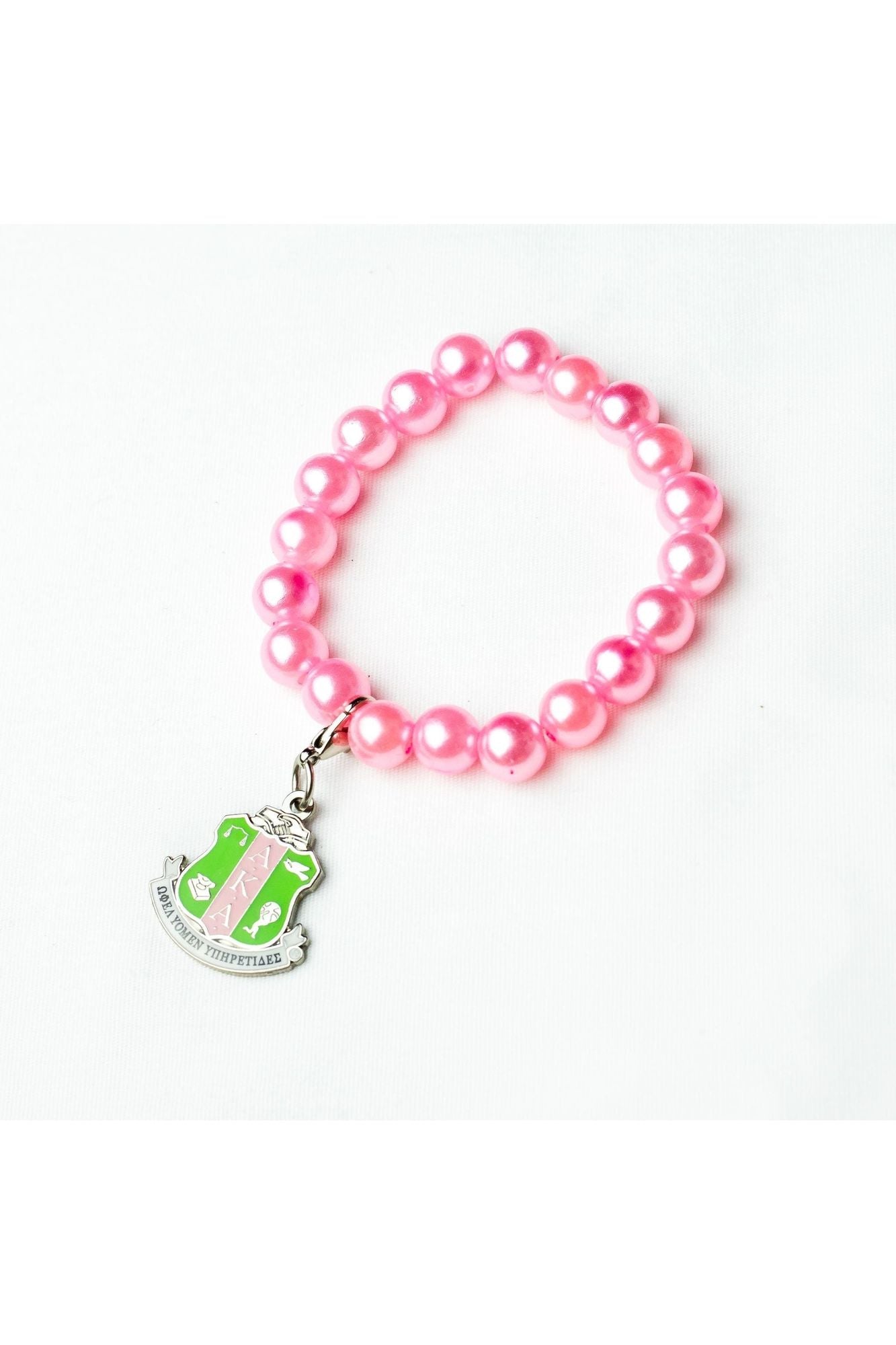 AKA Pink Pearl Bracelet with Shield Charm