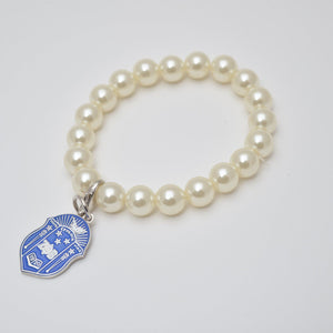 Pearl Bracelet with Zeta Shield Charm