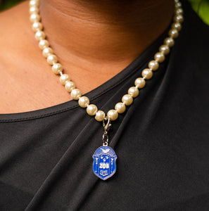 Pearl Necklace with ZETA Shield Charm